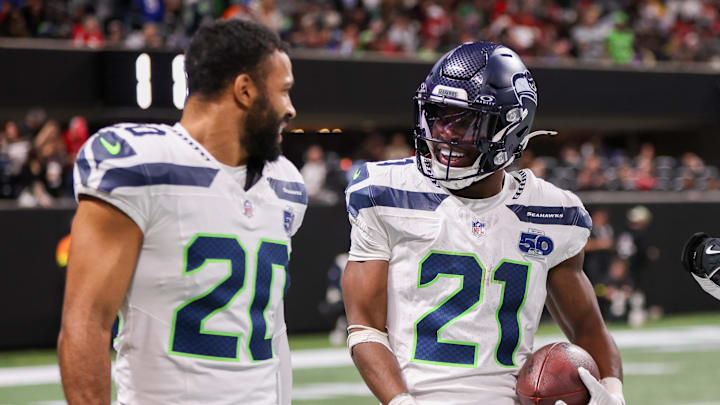 Dec 7, 2025; Atlanta, Georgia, USA; Seattle Seahawks cornerback Devon Witherspoon (21) celebrates with safety Julian Love (20) after an interception against the Atlanta Falcons in the fourth quarter at Mercedes-Benz Stadium. Mandatory Credit: Brett Davis-Imagn Images Dec 7, 2025; Atlanta, Georgia, USA; Seattle Seahawks cornerback Devon Witherspoon (21) celebrates with safety Julian Love (20) after an interception against the Atlanta Falcons in the fourth quarter at Mercedes-Benz Stadium. Mandatory Credit: Brett Davis-Imagn Images