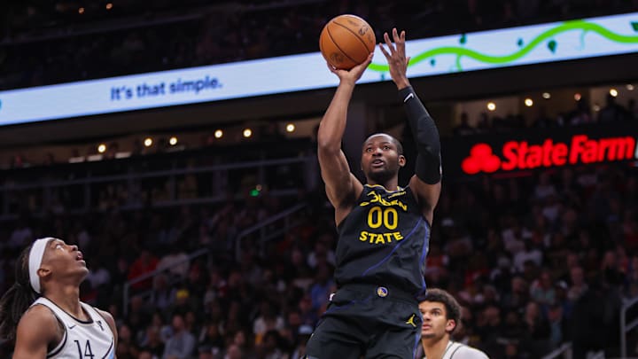 Mar 22, 2025; Atlanta, Georgia, USA; Golden State Warriors forward Jonathan Kuminga (00) shoots against the Atlanta Hawks in the third quarter at State Farm Arena. Mandatory Credit: Brett Davis-Imagn Images Mar 22, 2025; Atlanta, Georgia, USA; Golden State Warriors forward Jonathan Kuminga (00) shoots against the Atlanta Hawks in the third quarter at State Farm Arena. Mandatory Credit: Brett Davis-Imagn Images
