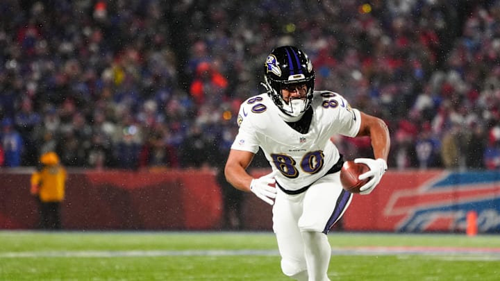 Baltimore Ravens tight end Isaiah Likely runs the ball after making a catch against the Buffalo Bills.
