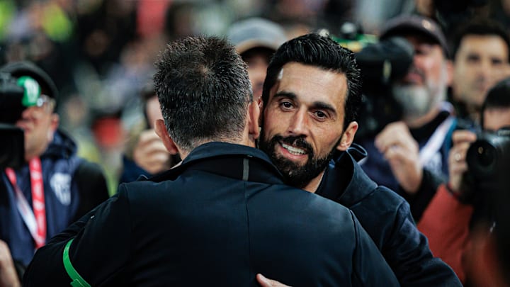 Head coach Carlos Corberan (Valencia CF) and head coach...