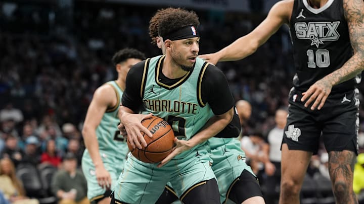 Feb 7, 2025; Charlotte, North Carolina, USA; Charlotte Hornets guard Seth Curry (30) grabs the rebound against the San Antonio Spurs during the second half at Spectrum Center. Mandatory Credit: Jim Dedmon-Imagn Images Feb 7, 2025; Charlotte, North Carolina, USA; Charlotte Hornets guard Seth Curry (30) grabs the rebound against the San Antonio Spurs during the second half at Spectrum Center. Mandatory Credit: Jim Dedmon-Imagn Images