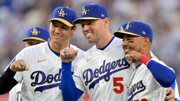 Los Angeles Dodgers two-way player Shohei Ohtani (17), first baseman Freddie Freeman (5) and shortstop Mookie Betts