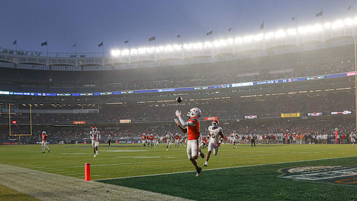 Dec 28, 2023; Bronx, NY, USA; Miami Hurricanes wide receiver Xavier Restrepo (7) catches a touchdown
