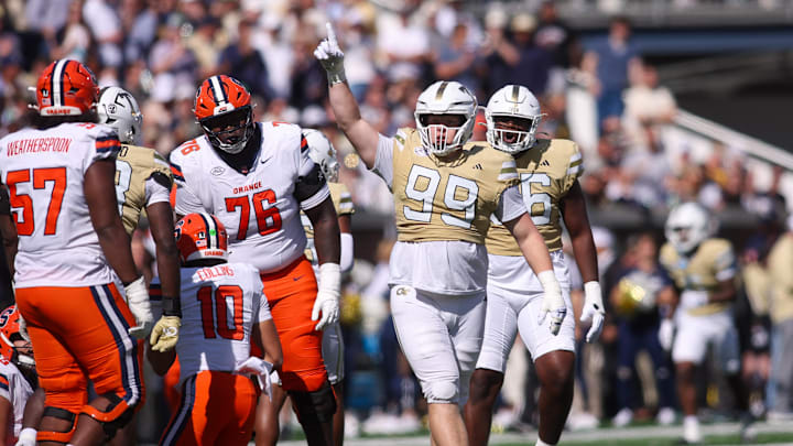 Oct 25, 2025; Atlanta, Georgia, USA; Georgia Tech Yellow Jackets defensive tackle Jordan van den Berg (99) reacts after a tackle against the Syracuse Orange in the second quarter at Bobby Dodd Stadium at Hyundai Field. Mandatory Credit: Brett Davis-Imagn Images
 Oct 25, 2025; Atlanta, Georgia, USA; Georgia Tech Yellow Jackets defensive tackle Jordan van den Berg (99) reacts after a tackle against the Syracuse Orange in the second quarter at Bobby Dodd Stadium at Hyundai Field. Mandatory Credit: Brett Davis-Imagn Images