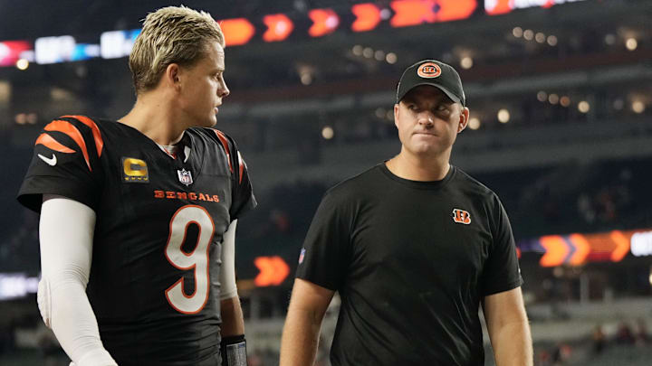 Cincinnati Bengals quarterback Joe Burrow and coach Zac Taylor walk off the field following a loss to the Washington Commanders on Sept. 23, 2024.