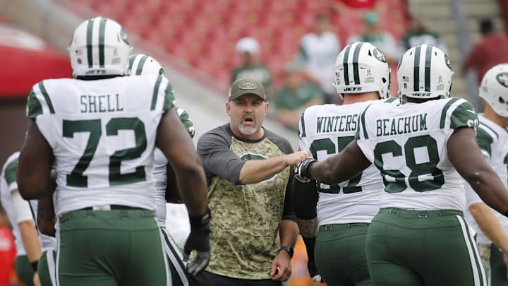 Nov 12, 2017; Tampa, FL, USA; New York Jets offensive coordinator John Morton bumps fists with offensive tackle Kelvin Beachum (68) and offensive tackle Brandon Shell (72) prior to the game at Raymond James Stadium. Mandatory Credit: Kim Klement-Imagn Images Nov 12, 2017; Tampa, FL, USA; New York Jets offensive coordinator John Morton bumps fists with offensive tackle Kelvin Beachum (68) and offensive tackle Brandon Shell (72) prior to the game at Raymond James Stadium. Mandatory Credit: Kim Klement-Imagn Images