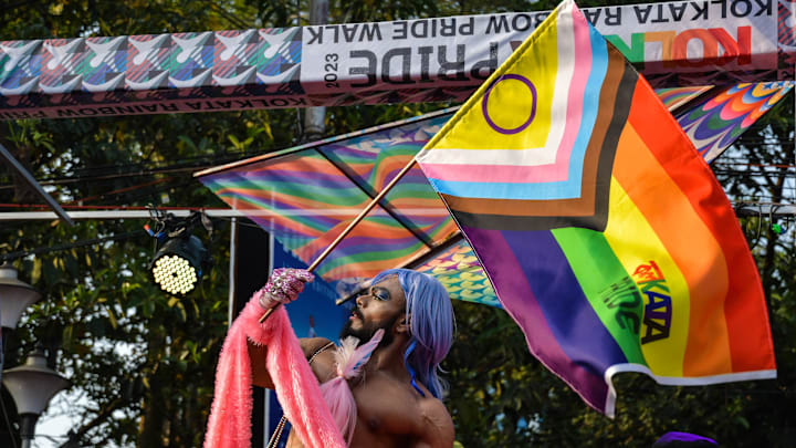 A member of The LGBTQ+ community of Kolkata holds a Progress...