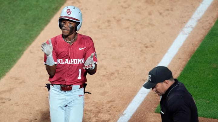 Oklahoma outfielder Jason Walk celebrates his grand slam at Oklahoma State on Tuesday night.