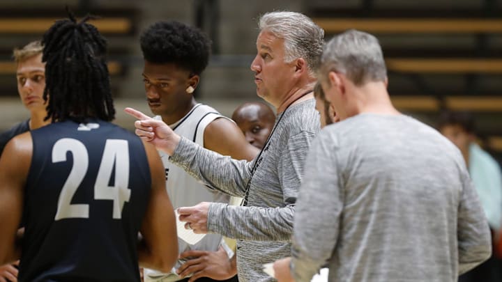 Purdue Boilermakers head coach Matt Painter leads a drill
