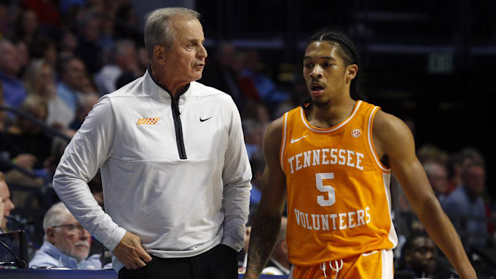 Dec 28, 2022; Oxford, Mississippi, USA;  Tennessee Volunteers head coach Rick Barnes (left) talks with Tennessee Volunteers guard Zakai Zeigler (5) as he checks out of the game during the first half against the Mississippi Rebels at The Sandy and John Black Pavilion at Ole Miss. Mandatory Credit: Petre Thomas-Imagn Images