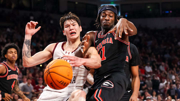 Jan 10, 2026; Columbia, South Carolina, USA; South Carolina Gamecocks guard Mike Sharavjamts (55) and Georgia Bulldogs forward Dylan James (11) battle for a lose ball in the first half at Colonial Life Arena. Mandatory Credit: Jeff Blake-Imagn Images Jan 10, 2026; Columbia, South Carolina, USA; South Carolina Gamecocks guard Mike Sharavjamts (55) and Georgia Bulldogs forward Dylan James (11) battle for a lose ball in the first half at Colonial Life Arena. Mandatory Credit: Jeff Blake-Imagn Images