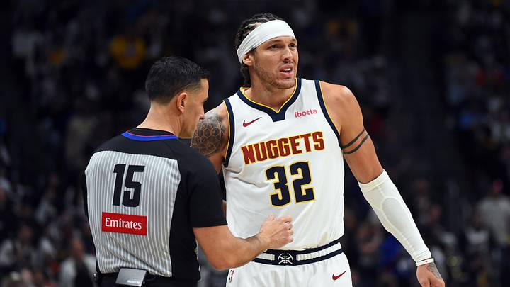 Apr 18, 2026; Denver, Colorado, USA; Denver Nuggets forward Aaron Gordon (32) talks with referee Zach Zarba (15) after a play during the second half against the Minnesota Timberwolves in game one of the first round of the 2026 NBA Playoffs at Ball Arena. Mandatory Credit: Christopher Hanewinckel-Imagn Images