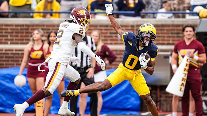 Michigan wide receiver Semaj Morgan (0) makes a catch for a touchdown against Central Michigan defensive back Elijah Rikard (2) during the first half at Michigan Stadium in Ann Arbor on Saturday, Sept. 13, 2025. Michigan wide receiver Semaj Morgan (0) makes a catch for a touchdown against Central Michigan defensive back Elijah Rikard (2) during the first half at Michigan Stadium in Ann Arbor on Saturday, Sept. 13, 2025.