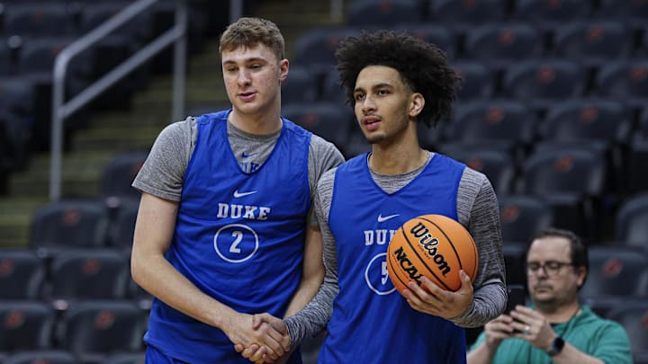 Mar 26, 2025; Newark, NJ, USA; Duke basketball forward Cooper Flagg (2) and guard Tyrese Proctor (5) during a practice session in preparation for an East Regional semifinal game against the Arizona Wildcats at Prudential Center.