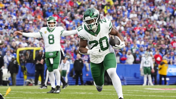 New York Jets running back Breece Hall runs with the ball against the Buffalo Bills during the first half at Highmark Stadium. Mandatory Credit: Gregory Fisher-Imagn Images New York Jets running back Breece Hall runs with the ball against the Buffalo Bills during the first half at Highmark Stadium. Mandatory Credit: Gregory Fisher-Imagn Images