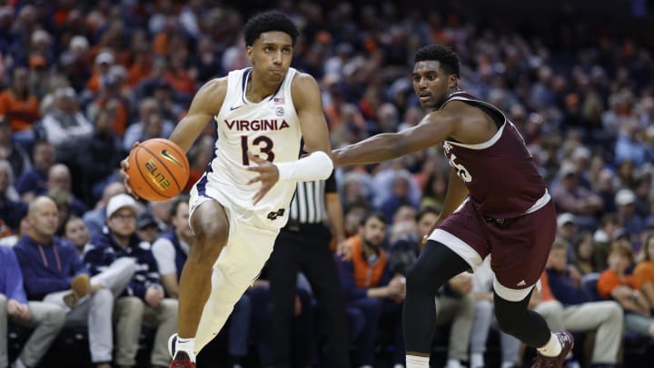 Ryan Dunn drives to the basket during the Virginia men's basketball game against Texas A&M at John Paul Jones Arena. Ryan Dunn drives to the basket during the Virginia men's basketball game against Texas A&M at John Paul Jones Arena.