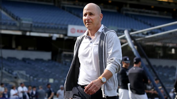 Jun 20, 2023; Bronx, New York, USA; New York Yankees general manager Brian Cashman on the field during batting practice before a game against the Seattle Mariners at Yankee Stadium. Mandatory Credit: Brad Penner-Imagn Images