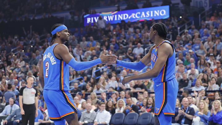 Apr 2, 2025; Oklahoma City, Oklahoma, USA; Oklahoma City Thunder guard Shai Gilgeous-Alexander (2) and forward Jalen Williams (8) high five after a play against the Detroit Pistons during the first quarter at Paycom Center. Mandatory Credit: Alonzo Adams-Imagn Images Apr 2, 2025; Oklahoma City, Oklahoma, USA; Oklahoma City Thunder guard Shai Gilgeous-Alexander (2) and forward Jalen Williams (8) high five after a play against the Detroit Pistons during the first quarter at Paycom Center. Mandatory Credit: Alonzo Adams-Imagn Images