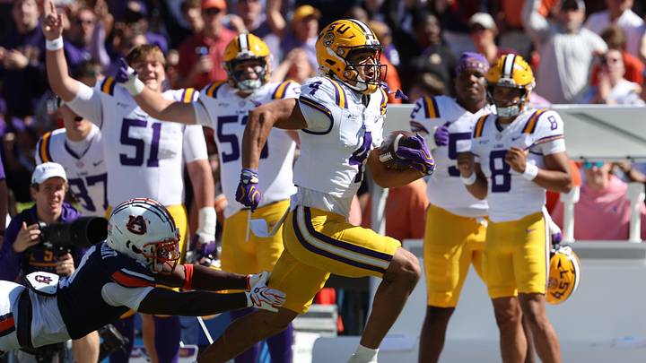 Oct 24, 2026; Auburn, Alabama, USA;  LSU Tigers wide receiver Jackson Harris (4) runs the ball during the second quarter against the Auburn Tigers at Jordan-Hare Stadium.  Mandatory Credit: John Reed-Imagn Images