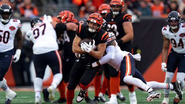 Chicago Bears linebacker Tremaine Edmunds (49) tackles Cincinnati Bengals tight end Tanner Hudson (87) as he makes a catch in the fourth quarter of the NFL football game between Chicago Bears and Cincinnati Bengals at Paycor Stadium in Cincinnati on Nov. 2, 2025.