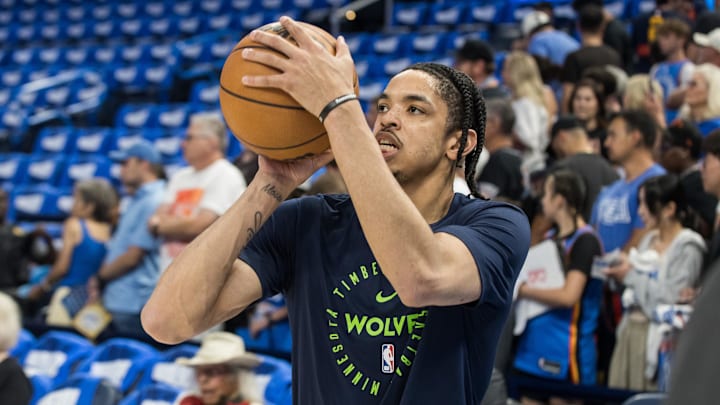 May 22, 2025; Oklahoma City, Oklahoma, USA; Minnesota Timberwolves forward Josh Minott (8) warms up before game two against the Oklahoma City Thunder of the western conference finals for the 2025 NBA Playoffs at Paycom Center. Mandatory Credit: Brett Rojo-Imagn Images