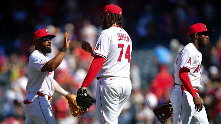 Apr 6, 2025; Anaheim, California, USA; Los Angeles Angels third baseman Luis Rengifo (2) and pitcher Kenley Jansen (74) celebrate the victory against the Cleveland Guardians  at Angel Stadium. Mandatory Credit: Gary A. Vasquez-Imagn Images