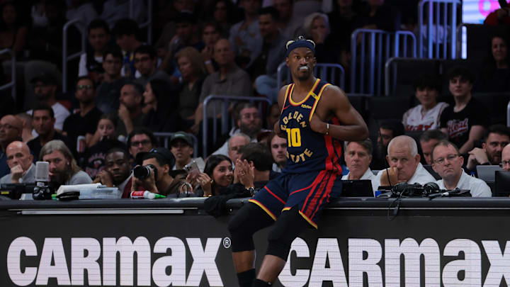 Mar 25, 2025; Miami, Florida, USA; Golden State Warriors forward Jimmy Butler III (10) looks on against the Miami Heat during the second quarter at Kaseya Center. Mandatory Credit: Sam Navarro-Imagn Images
