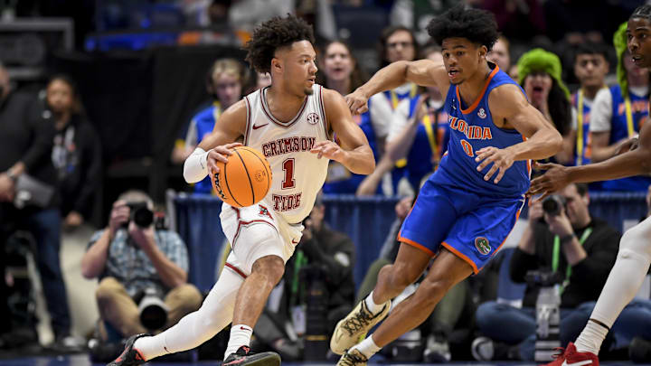 Mar 15, 2024; Nashville, TN, USA;  Alabama Crimson Tide guard Mark Sears (1) drives to the basket against the Florida Gators during the first half at Bridgestone Arena. Mandatory Credit: Steve Roberts-Imagn Images