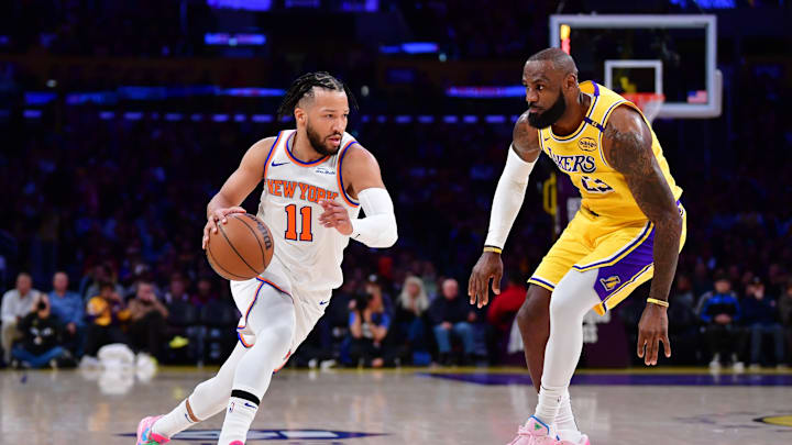 Mar 6, 2025; Los Angeles, California, USA; New York Knicks guard Jalen Brunson (11) moves the ball against Los Angeles Lakers forward LeBron James (23) during the first half at Crypto.com Arena. Mandatory Credit: Gary A. Vasquez-Imagn Images Mar 6, 2025; Los Angeles, California, USA; New York Knicks guard Jalen Brunson (11) moves the ball against Los Angeles Lakers forward LeBron James (23) during the first half at Crypto.com Arena. Mandatory Credit: Gary A. Vasquez-Imagn Images