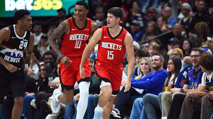 Dec 20, 2025; Denver, Colorado, USA; Houston Rockets guard Reed Sheppard (15) celebrates after making a basket during the second half against the Denver Nuggets at Ball Arena. Mandatory Credit: Christopher Hanewinckel-Imagn Images