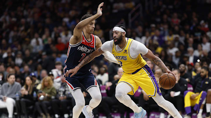 Apr 3, 2024; Washington, District of Columbia, USA; Los Angeles Lakers forward Anthony Davis (3) drives to the basket as Washington Wizards forward Patrick Baldwin Jr. (7) defends in the first half at Capital One Arena. Mandatory Credit: Geoff Burke-Imagn Images Apr 3, 2024; Washington, District of Columbia, USA; Los Angeles Lakers forward Anthony Davis (3) drives to the basket as Washington Wizards forward Patrick Baldwin Jr. (7) defends in the first half at Capital One Arena. Mandatory Credit: Geoff Burke-Imagn Images