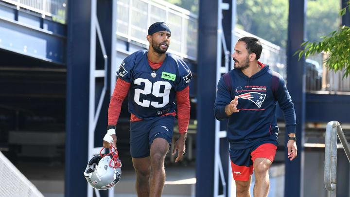 Jul 30, 2022; Foxborough, MA, USA; New England Patriots defensive back Justin Bethel (29) walks to the practice field at the Patriots training camp at Gillette Stadium. Mandatory Credit: Eric Canha-USA TODAY Sports Jul 30, 2022; Foxborough, MA, USA; New England Patriots defensive back Justin Bethel (29) walks to the practice field at the Patriots training camp at Gillette Stadium. Mandatory Credit: Eric Canha-USA TODAY Sports