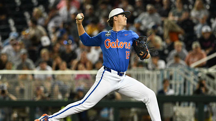 Jun 15, 2024; Omaha, NE, USA;  Florida Gators starting pitcher Liam Peterson (12) throws against the Texas A&M Aggies during the first inning at Charles Schwab Field Omaha. Mandatory Credit: Steven Branscombe-Imagn Images