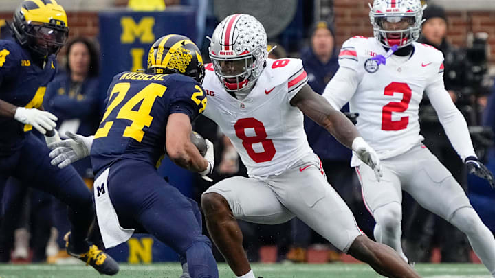 Ohio State Buckeyes linebacker Arvell Reese (8) tackles Michigan Wolverines running back Bryson Kuzdzal (24) during the NCAA football game at Michigan Stadium in Ann Arbor, Mich. on Nov. 29, 2025. Ohio State won 27-9. Ohio State Buckeyes linebacker Arvell Reese (8) tackles Michigan Wolverines running back Bryson Kuzdzal (24) during the NCAA football game at Michigan Stadium in Ann Arbor, Mich. on Nov. 29, 2025. Ohio State won 27-9.