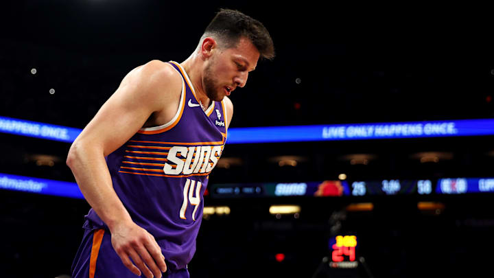 Apr 9, 2024; Phoenix, Arizona, USA;  Phoenix Suns forward Drew Eubanks (14) reacts during the second quarter of the game against the LA Clippers at Footprint Center. Mandatory Credit: Mark J. Rebilas-Imagn Images