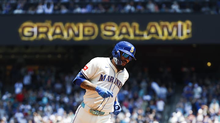 Seattle Mariners shortstop J.P. Crawford (3) runs the bases after hitting a grand-slam home run against the Cleveland Guardians during the second inning at T-Mobile Park on June 15. Seattle Mariners shortstop J.P. Crawford (3) runs the bases after hitting a grand-slam home run against the Cleveland Guardians during the second inning at T-Mobile Park on June 15.