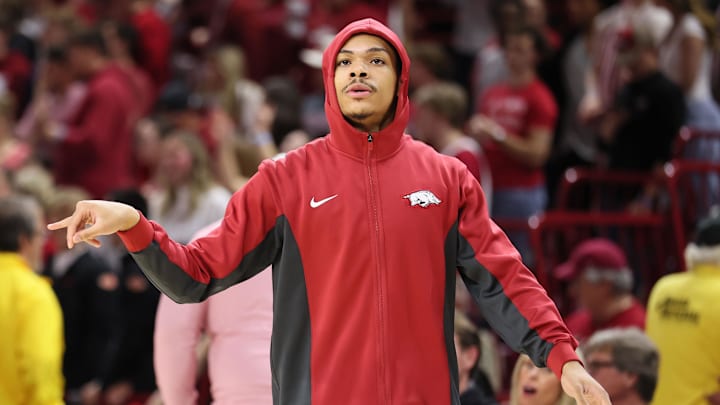 Mar 4, 2026; Fayetteville, Arkansas, USA; Arkansas Razorbacks guard Darius Acuff Jr warms up prior to the game against the Texas Longhorns at Bud Walton Arena. Mandatory Credit: Nelson Chenault-Imagn Images