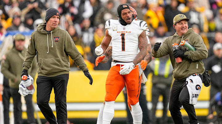 Cincinnati Bengals wide receiver Ja'Marr Chase (1) is pushed out of a skirmish at midfield in the fourth quarter of the NFL Week 11 game between the Pittsburgh Steelers and the Cincinnati Bengals at Acrisure Stadium in Pittsburgh on Sunday, Nov. 16, 2025. The Bengals lost 34-12.