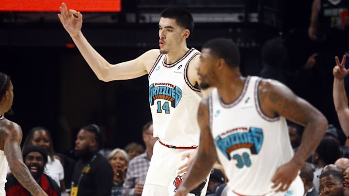 Memphis Grizzlies center Zach Edey (14) reacts after three-point basket during the first half against the Orlando Magic at FedExForum. 