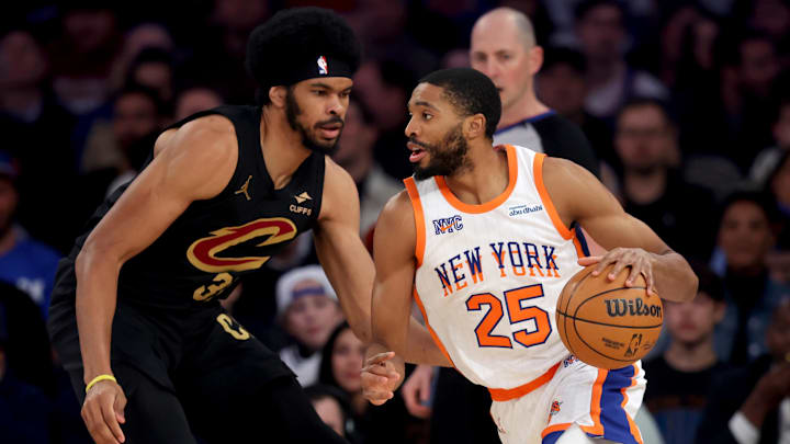 New York Knicks forward Mikal Bridges drives to the basket against Cleveland Cavaliers center Jarrett Allen during the first quarter at Madison Square Garden. Mandatory Credit: Brad Penner-Imagn Images