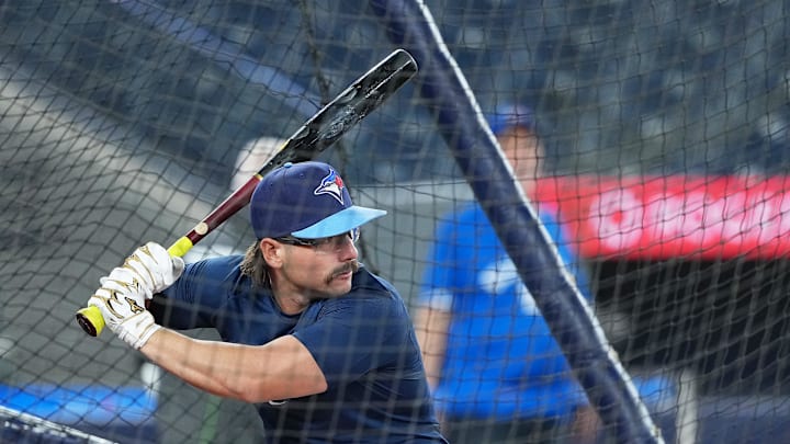 Toronto Blue Jays outfielder Davis Schneider (36) takes batting practice before the game against the Washington Nationals at Rogers Centre on April 2. Toronto Blue Jays outfielder Davis Schneider (36) takes batting practice before the game against the Washington Nationals at Rogers Centre on April 2.