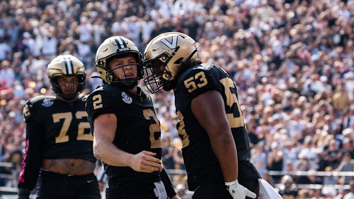 Vanderbilt quarterback Diego Pavia (2) celebrates with Vanderbilt offensive lineman Jordan White (53) during the game between Vanderbilt University and Louisiana State University at FirstBank Stadium in Nashville, Tenn., Saturday, Oct. 18, 2025.