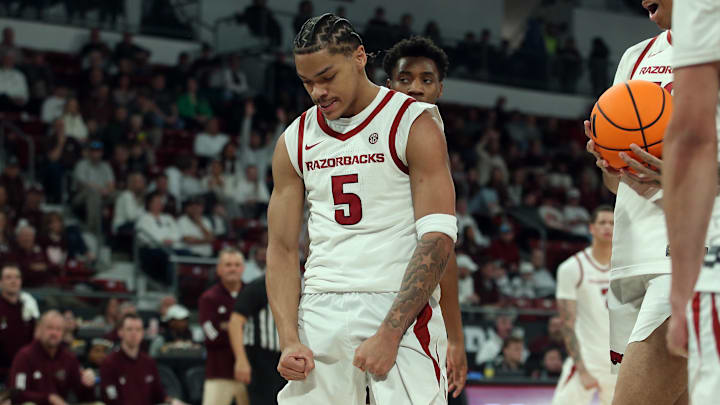 Feb 7, 2026; Starkville, Mississippi, USA; Arkansas Razorbacks guard Darius Acuff Jr. (5) reacts after a basket during the first half against the Mississippi State Bulldogs at Humphrey Coliseum. Mandatory Credit: Petre Thomas-Imagn Images