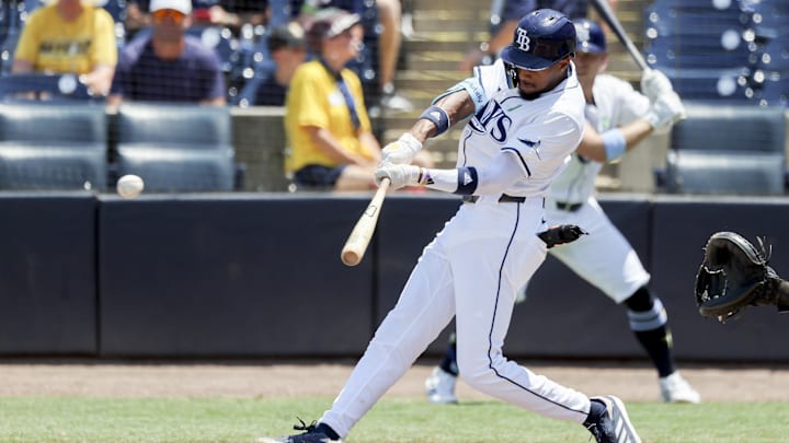 Tampa Bay Rays outfielder Chandler Simpson (14) singles during the fourth inning against the Toronto Blue Jays at George M. Steinbrenner Field on May 25.