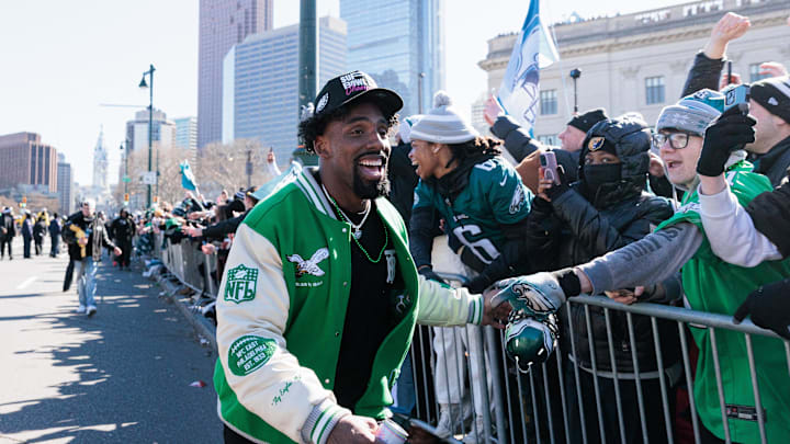 Feb 14, 2025; Philadelphia, PA, USA; Philadelphia Eagles defensive tackle Thomas Booker IV (59) celebrates with fans during the Super Bowl LIX championship parade and rally. Mandatory Credit: Caean Couto-Imagn Images Feb 14, 2025; Philadelphia, PA, USA; Philadelphia Eagles defensive tackle Thomas Booker IV (59) celebrates with fans during the Super Bowl LIX championship parade and rally. Mandatory Credit: Caean Couto-Imagn Images