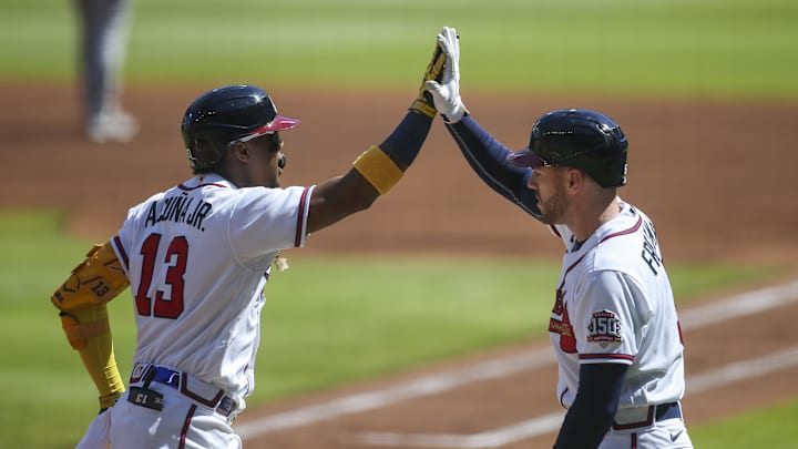 Atlanta Braves right fielder Ronald Acuna Jr. (13) celebrates after a home run with first baseman Freddie Freeman