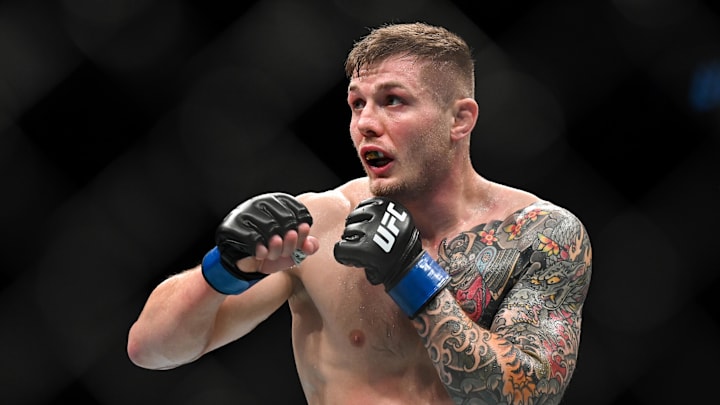 Sep 3, 2022; Paris, FRANCE; Marvin Vettori (blue gloves) during the fight against Robert Whittaker