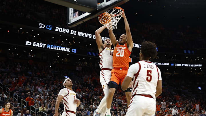 Mar 28, 2024; Boston, MA, USA; Illinois Fighting Illini forward Ty Rodgers (20) dunks the ball over Iowa State Cyclones forward Robert Jones (12) in the semifinals of the East Regional of the 2024 NCAA Tournament at TD Garden. Mandatory Credit: Winslow Townson-Imagn Images