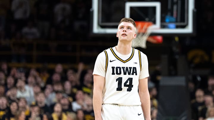 Iowa guard Bennett Stirtz (14) looks at a replay March 5, 2026 during a Big Ten basketball game against the Michigan Wolverines at Carver-Hawkeye Arena in Iowa City, Iowa.