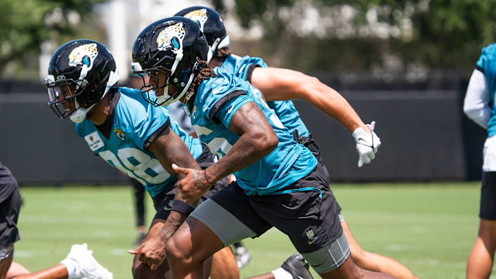 Jacksonville Jaguars running back LeQuint Allen (36), right, runs sprints during the fourth organized team activity at the Miller Electric Center in Jacksonville, Fla. Tuesday, May 27, 2025. [Doug Engle/Florida Times-Union]